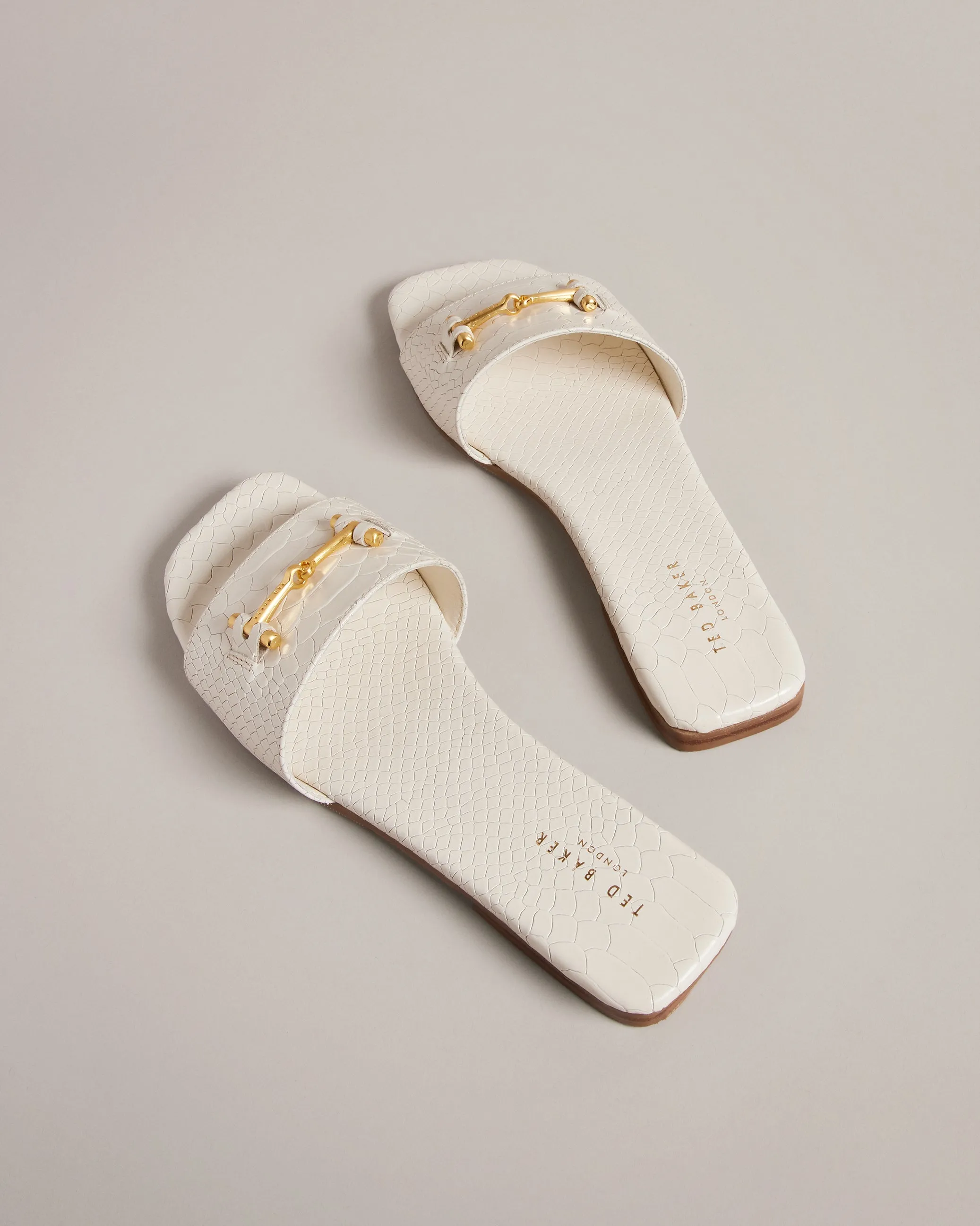 Ashinu Leather Equestrian Sandals Ivory